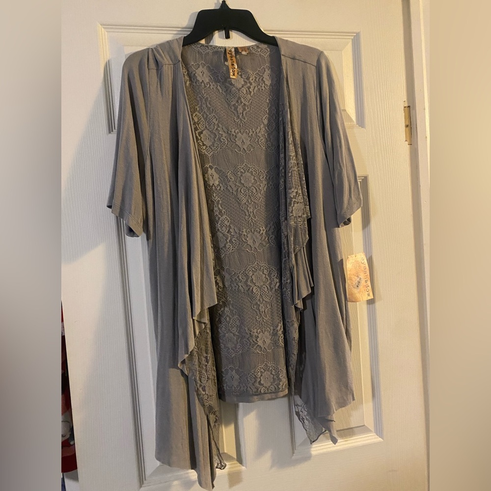 Brand new with tags, Macy’s. Over the shirt, cotton with lace.